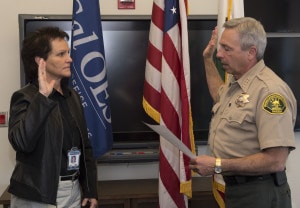 Cal O E S Law Branch Chief Mark Pazin swears in new Assistant Chief Sheri Sarro