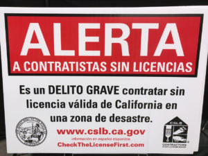 Unlicensed Contractors Beware Sign in Spanish