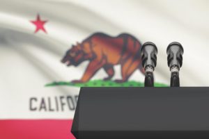 Photo of California State Flag and Podium