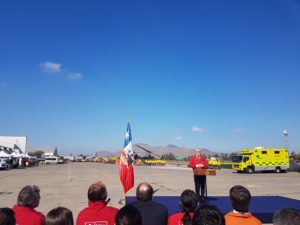 Person speaking at event about wildfires in Chile
