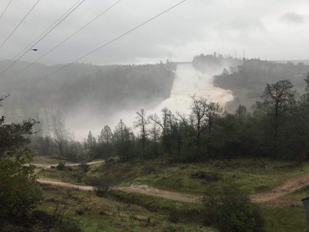 Raging water flows out of the Oroville Dam spillway prior to closure