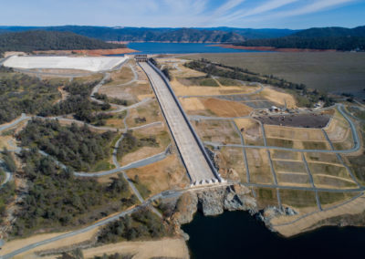 A drone provides a view of the Lake Oroville main spillway and the excavation done to re-establish the hillside grade and provide erosion control at the Butte County, California site. Photo taken February 4, 2020.