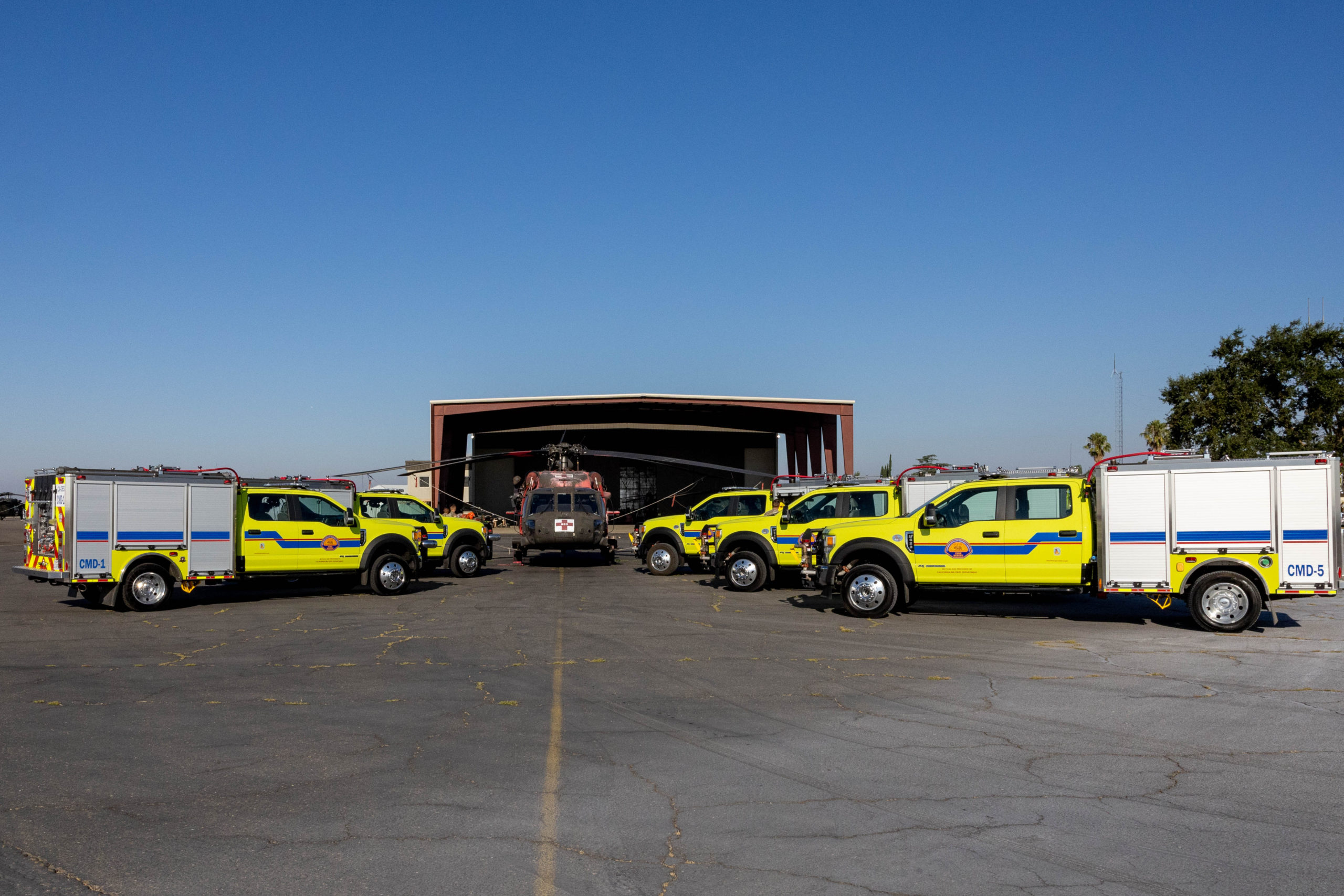 photo of OES engines next to a Blackhawk helicopter