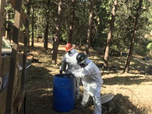 DTSC Hazmat crews clear Hazardous Household Waste from residential properties detroyed by the Oak Fire
