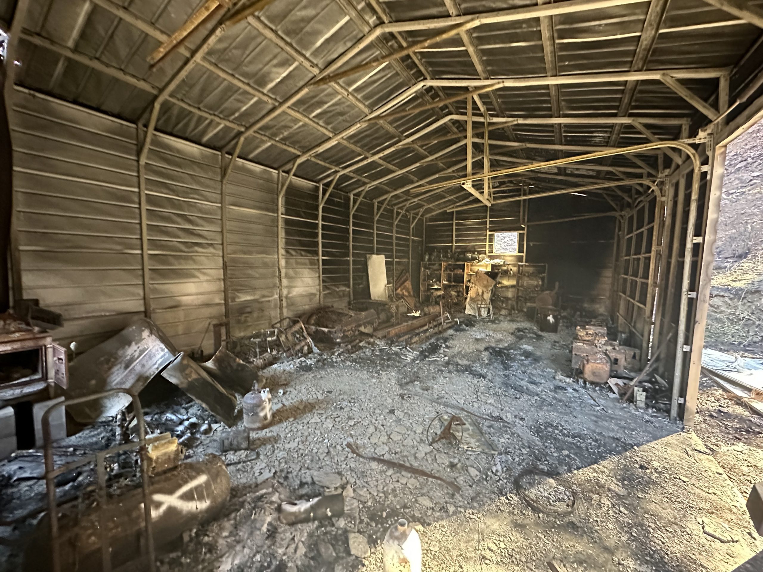 Inside a metal structure where a wildfire occurred.
