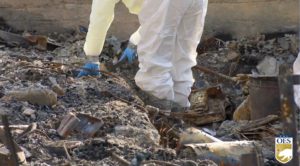 Crews clearing household hazardous materials in phase 1 debris removal during LA fires recovery.