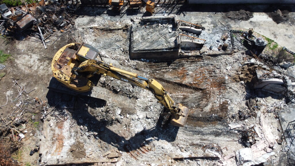 photo of dozer and debris